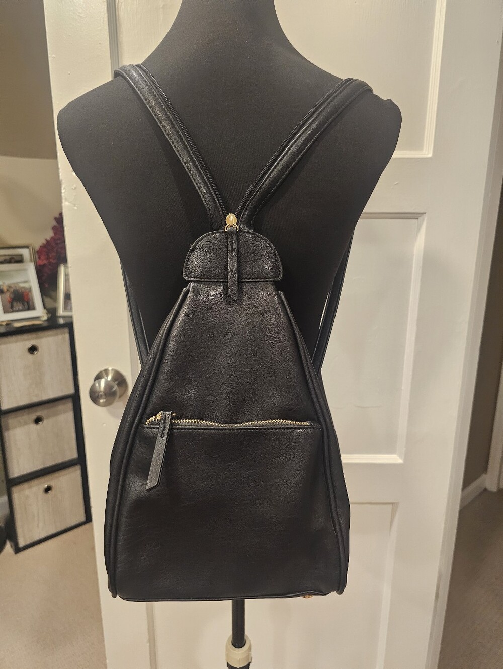 Sleek 2 Way Convertible Black Leather Sling Backpack with Gold Accents